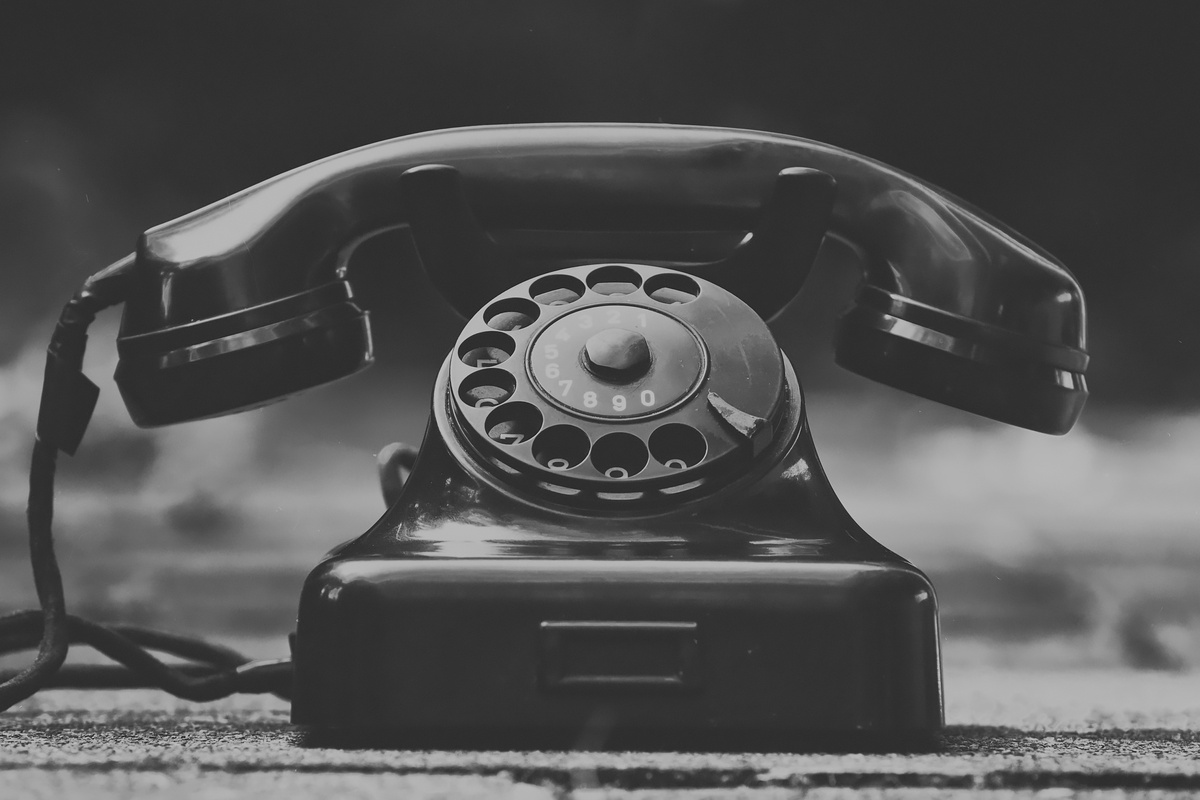 Grayscale Photo of a Vintage Telephone